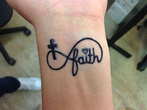 We've also seen a growing trend of henna tattoos painted on a mother's pregnant belly! Faith infinity and cross henna tattoo | Henna | Pinterest ...