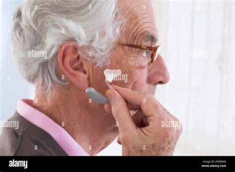 Elderly Person Hearing Aid Hi Res Stock Photography And Images Alamy