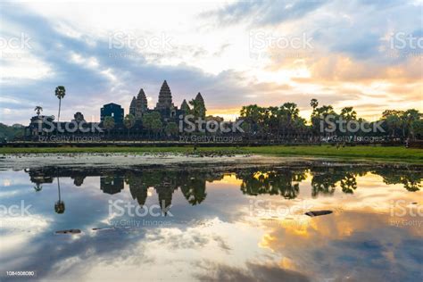 Water Reflection Of Angkor Wat In Cambodia Stock Photo Download Image