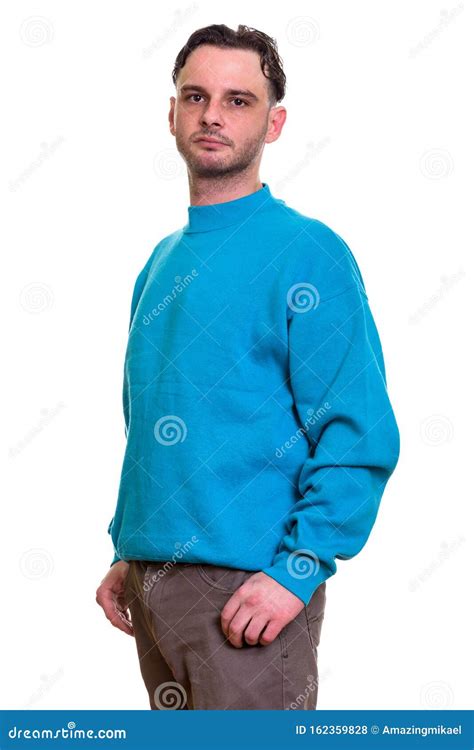 Studio Shot Of Man Standing And Wearing Blue Sweater Stock Photo Image Of Adult Isolated