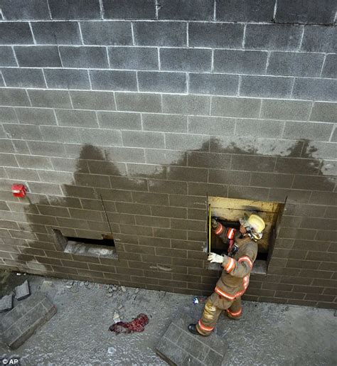 woman trapped between two walls in portland apologizes and thanks rescuers but still won t say