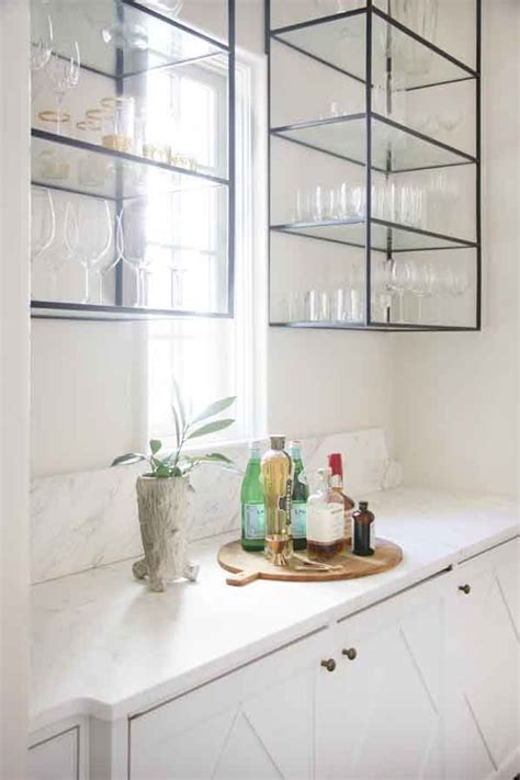 Pair of painted wood doors with iron inserts dimensions are 52 wide x 103 high. Bar with Custom Iron & Glass Cabinets by Lisa Sherry ...