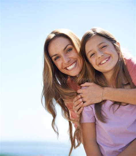 holiday love and affection portrait of a loving mother and daughter standing together in the
