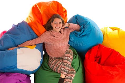 Young Cute Woman Sitting Between Beanbag Chairs Stock Photo Image Of