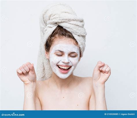 Pretty Woman With A Towel On Her Head Face Mask Naked Shoulders Attractive Look Stock Image