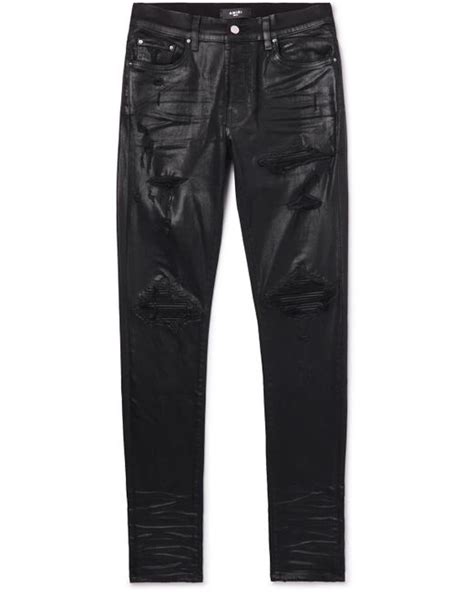 Amiri Mx1 Skinny Fit Distressed Leather Panelled Coated Jeans In Gray