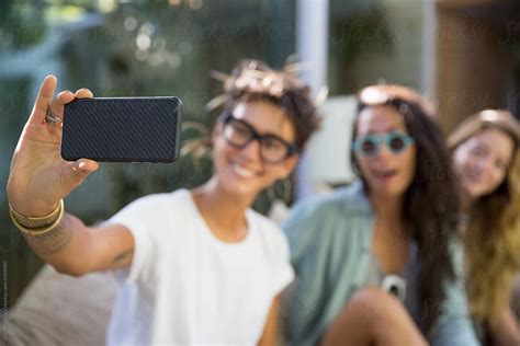 Three Women Take Fun Selfie Together On Sunny Day Del Colaborador De Stocksy Jovo Jovanovic