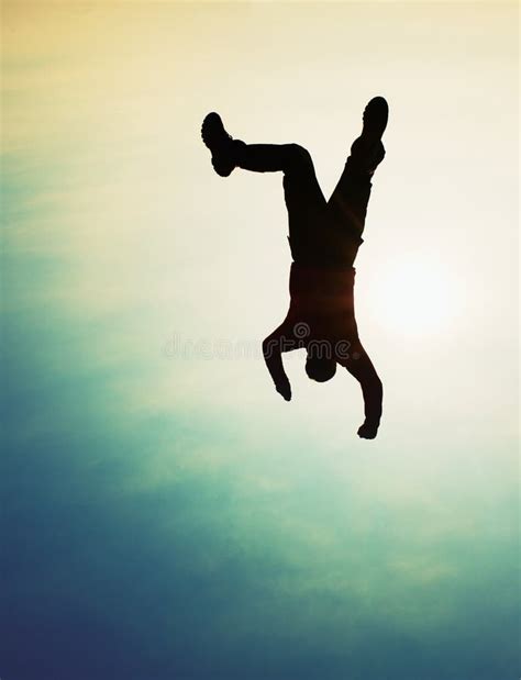 Flying Man Young Man Falling Down On Sky Background Stock Image