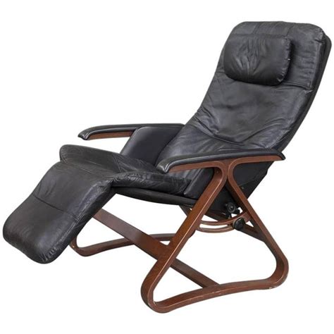 Explore our range of leather armchairs and leather recliner chairs at ikea. Contemporary Black Leather and Wood Reclining Armchair ...