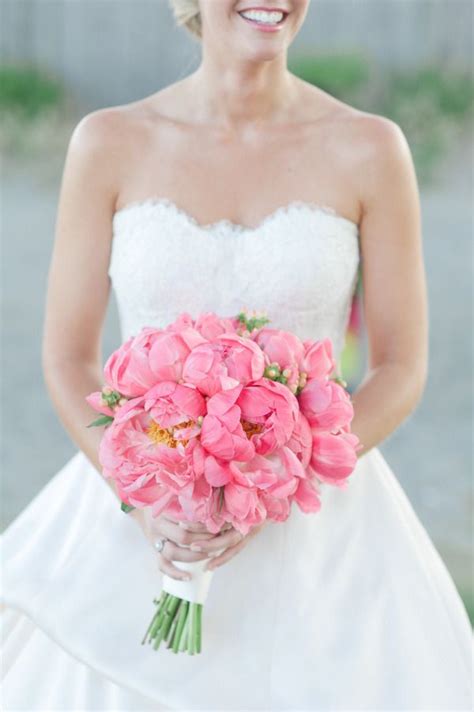 Maybe you would like to learn more about one of these? pink wedding ideas- Bright pink peonies bridal bouquet ...