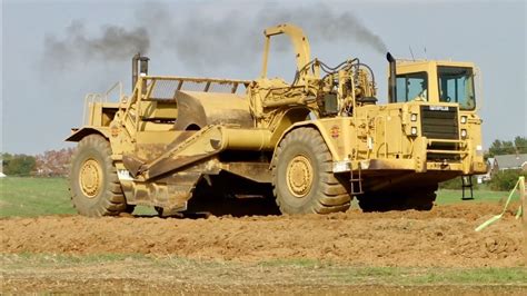 Large Caterpillar Earth Movers And Water Truck Working Youtube