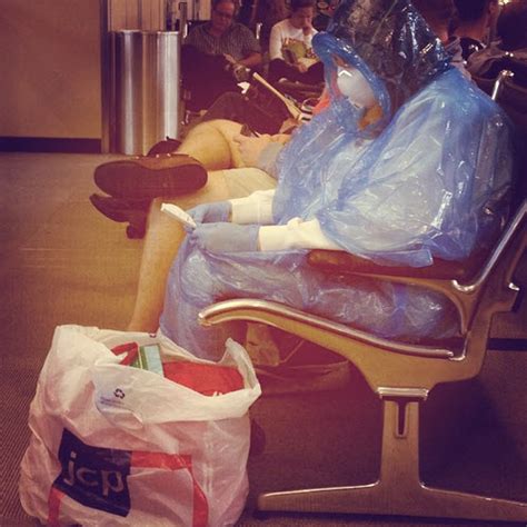 Passenger Wears A Hazmat Suit To Dulles Airport