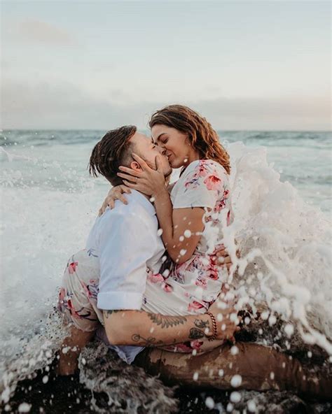 Engagement Photos At The Beach Water Splashing Couples Photography In