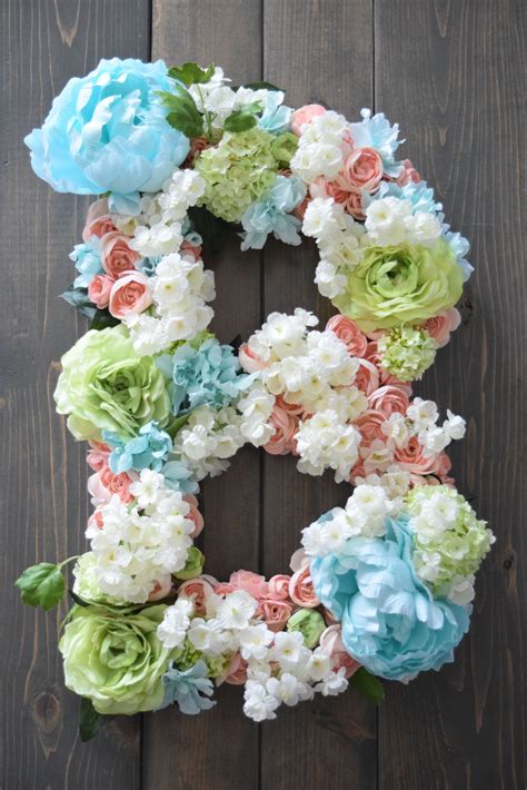 Dollar tree diy crafts ideas like this are so rewarding to make. Bailey Begonia on Etsy - large flower letter, large flower letter diy, large flower letters ...