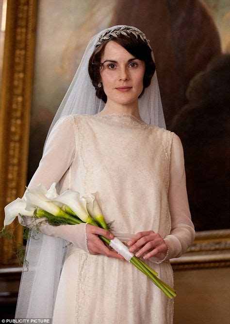 Michelle Dockery Is Every Inch The English Rose In Lilac Coat Downton
