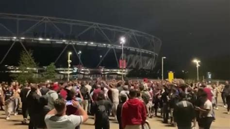 West Ham Fans Clash With Riot Police As They Set Of Flares To Celebrate Historic Win In Lbc