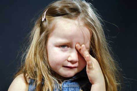 Crying Blond Little Girl With Focus On Her Tears Stock Image Image Of