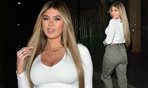 Love Islands Belle Hassan Displays Her Cleavage In A Busty White Crop