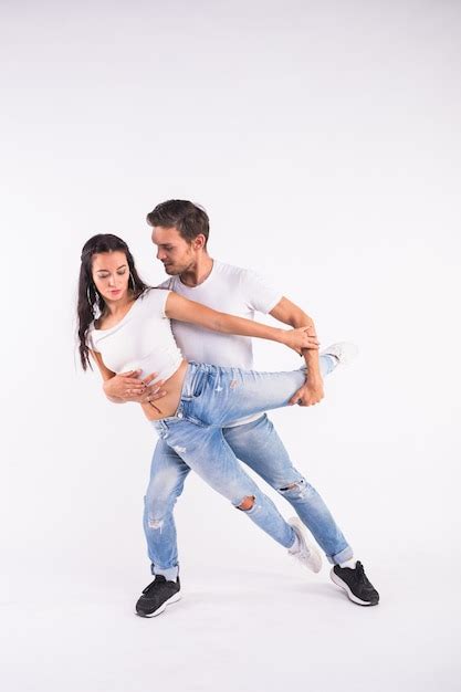 Premium Photo Young Couple Dancing Social Latin Dance Bachata Merengue Salsa Two Elegance Pose
