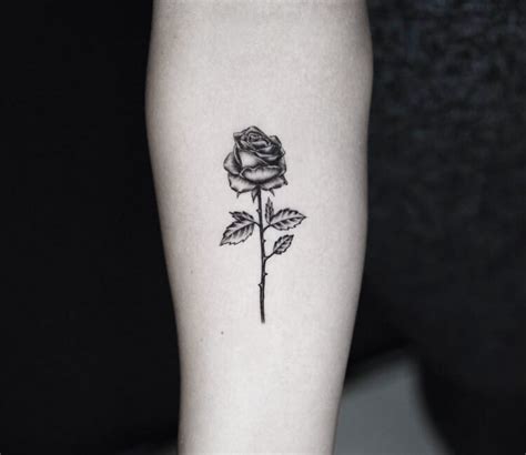 For example, a black rose is a symbol of a painful loss. Rose tattoo by Sebastian Echeverria | Post 27343