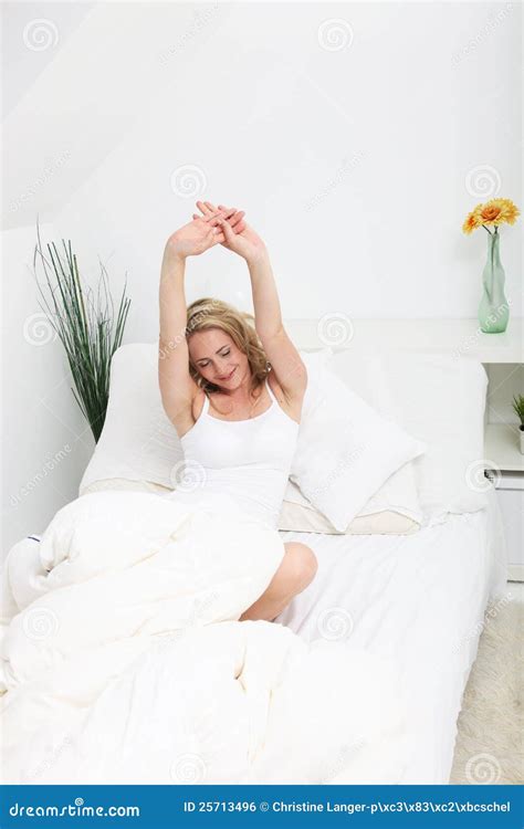 Woman Stretching In Bed Stock Photo Image Of Awaken