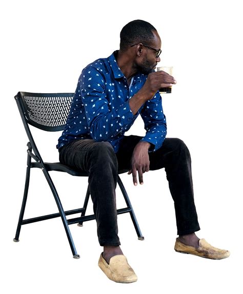 African Man Sitting On A Chair Drinking Coffee Afrikut