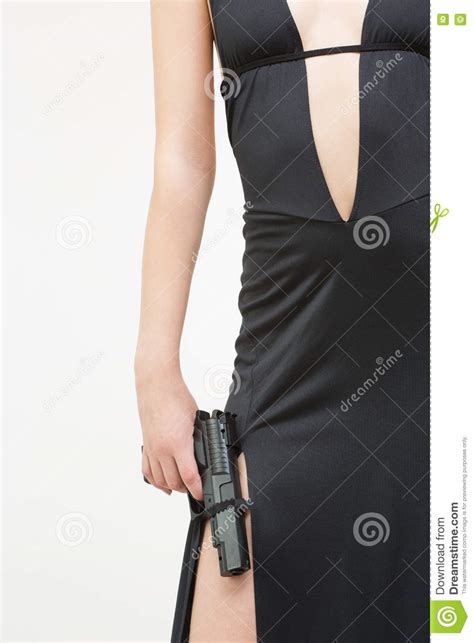 Woman In Black Dress Holding Gun Stock Photo Image Of Closeup Female