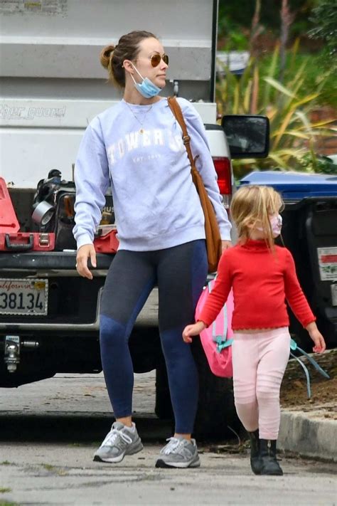 olivia wilde keeps it casual as she takes her daughters to a kids club 