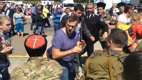 Cossacks Clash Violently With Kremlin Opposition Leader And Supporters