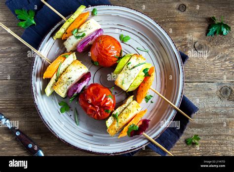 Halloumi Cheese And Vegetables Grilled Skewers On Plate With Spices And