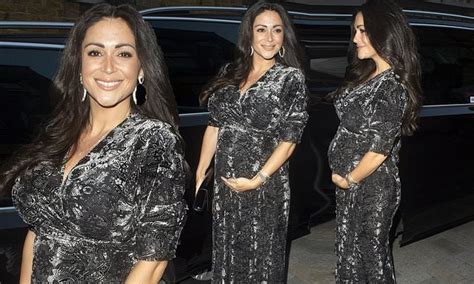 Casey Batchelor Cradles Her Growing Baby Bump And Dons A Grey Velvet Gown At Clothing Launch