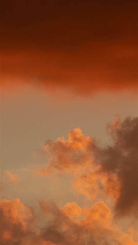 Download Wallpaper 1080x1920 Clouds Sky Sunset Beautiful Orange