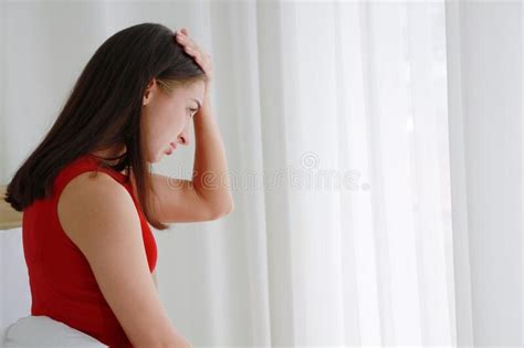 Caucasian Woman Suffering From Depression Sitting Alone In Bedroom She