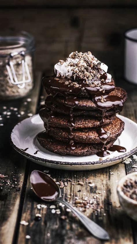 Vegan Chocolate Oatmeal Pancakes With Chocolate Sauce And Vanilla Cream