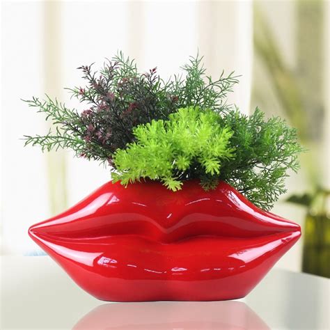 Maybe you would like to learn more about one of these? creative flower vase red mouth shaped plant pot modern ...