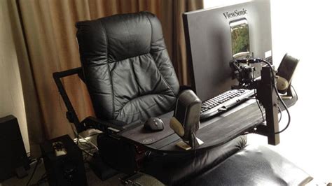 A Computer In A Leather Recliner A Compact And Comfortable Workspace