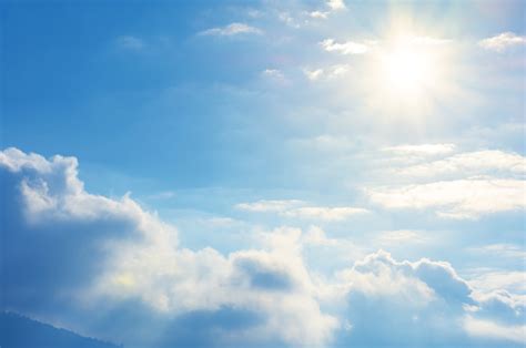 Blue Sky With Sun And Clouds Stock Photo Download Image Now Istock
