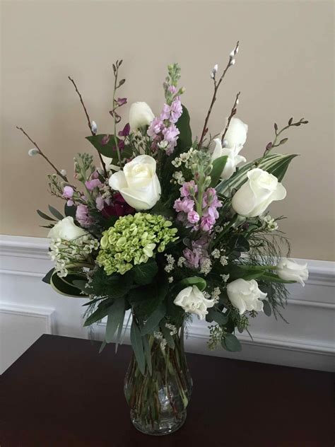 Often created with lilies and other white floral stems a sympathy flower bouquet is delivered to a. Vase Arrangements (Sympathy) - Fleur-tatious Floral Design