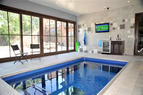A Beautiful Indoor Endless Pool With A Great View Outside And Some