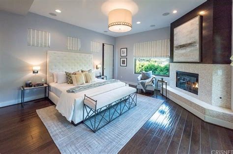 Hardwood flooring is becoming a popular alternative to carpeting for bedrooms. 101 Master Bedroom with Hardwood Floors (2018)
