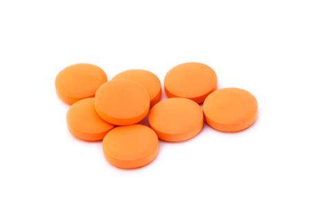 Orange Pills Isolated On White Background Stock Photo Download Image