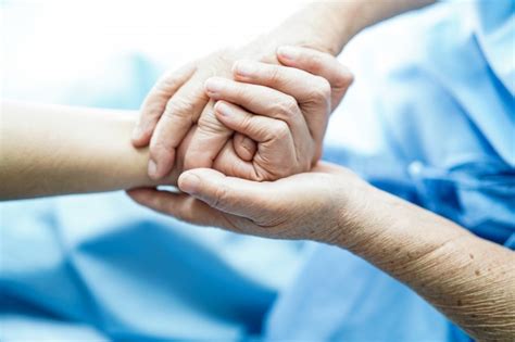 Premium Photo Doctor Holding Touching Hands Asian Senior Or Elderly