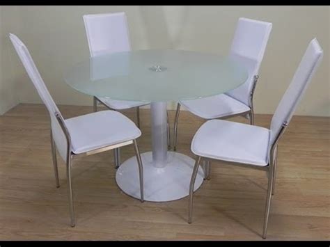 Su gama de colores es amplia sobre todo en. Descatalogado - Pack mesa redonda cristal blanco + sillas ...