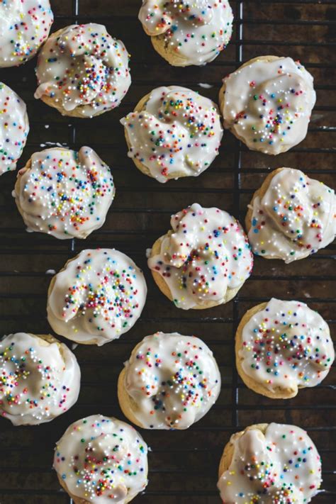 The texture of these cookies is that of a cake more than a can i get away with serving lemon cookies at christmas time? Italian Lemon Knot Cookies-Taralli al Limone - Savoring Italy