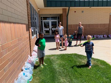 Kindergarten Kids Pick Up Their Belongings Spring Lake Elementary