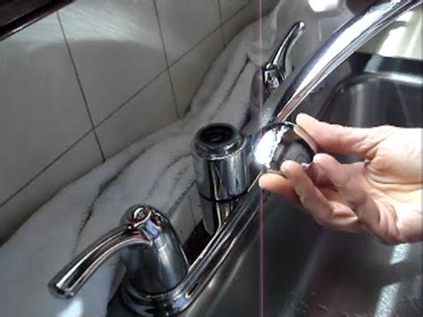 The wrench's size must fit inside the handle cap. Two Handle Kitchen Faucet Repair - Moen - YouTube