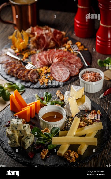 Assortment Of Italian Antipasti Cold Cuts And Cheese Plate Stock Photo