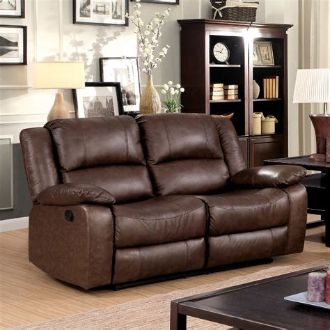 Reganold Transitional Faux Leather Reclining Loveseat Brown