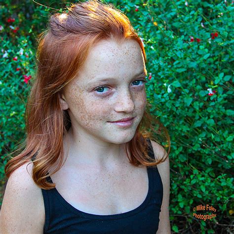 Ginger Girl Pre Teen Bright Redhead Freckles On Alabaster Skin Twelve Year Old Model