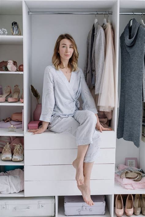 Portrait Of A Young Woman Woman In Her Modern Dressing Room Looks At